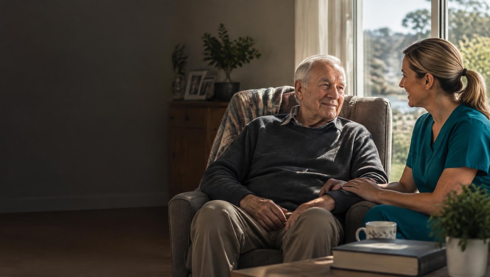 Community nurse having a supportive conversation with an older person at home